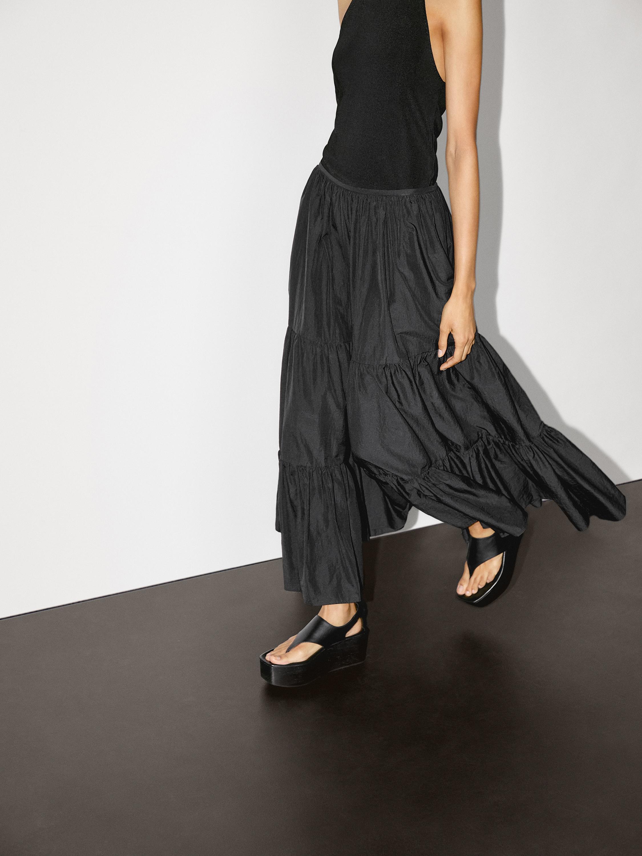 Long flared skirt with gathered detail